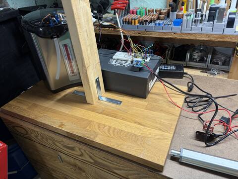 2×4 post mounted to the butcher-block base
