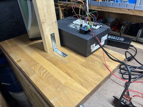 Angle bracket brace with power brick and H-bridge below